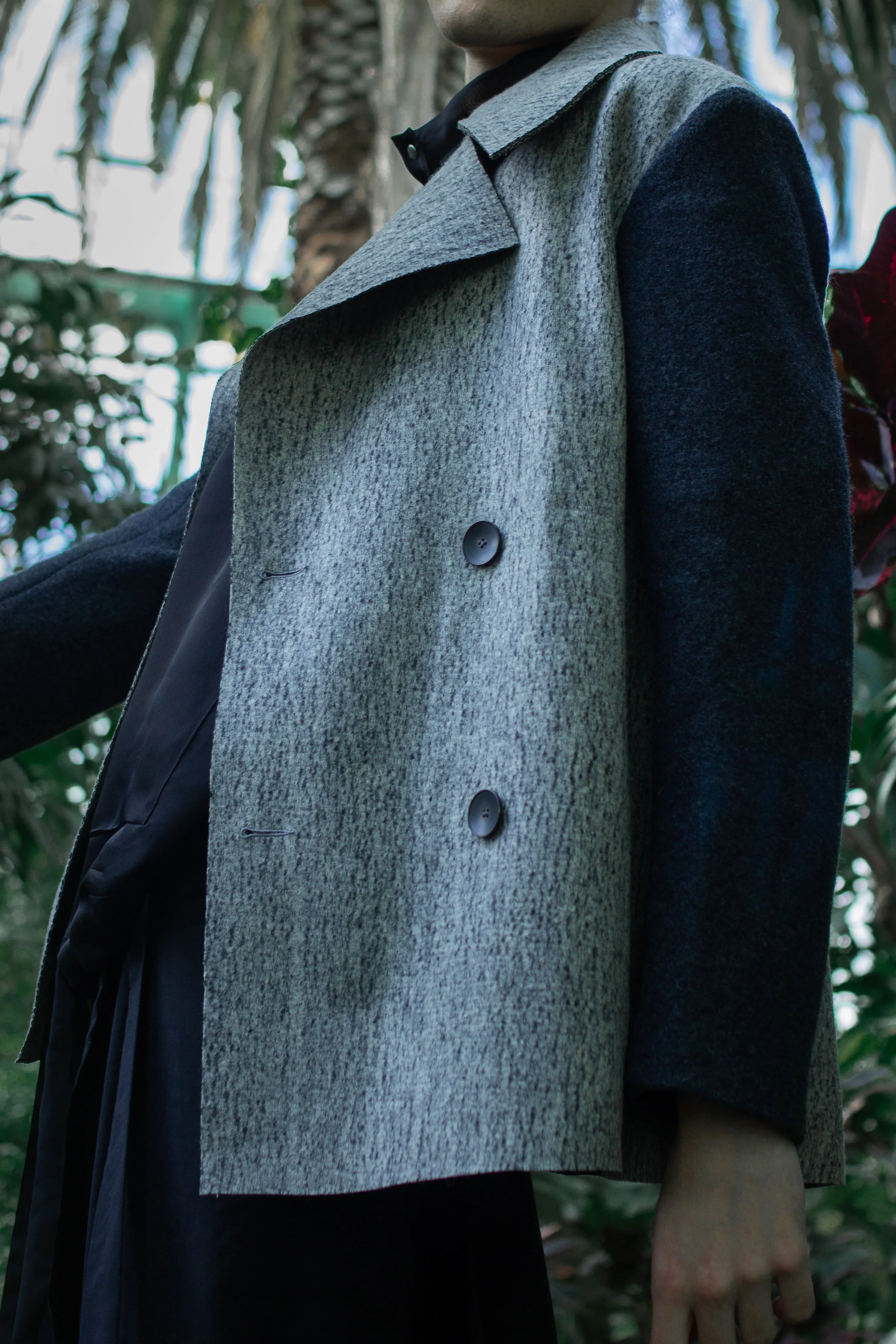 Gender-neutral Marbled Kobe Pea-coat with faux shearling sleeves