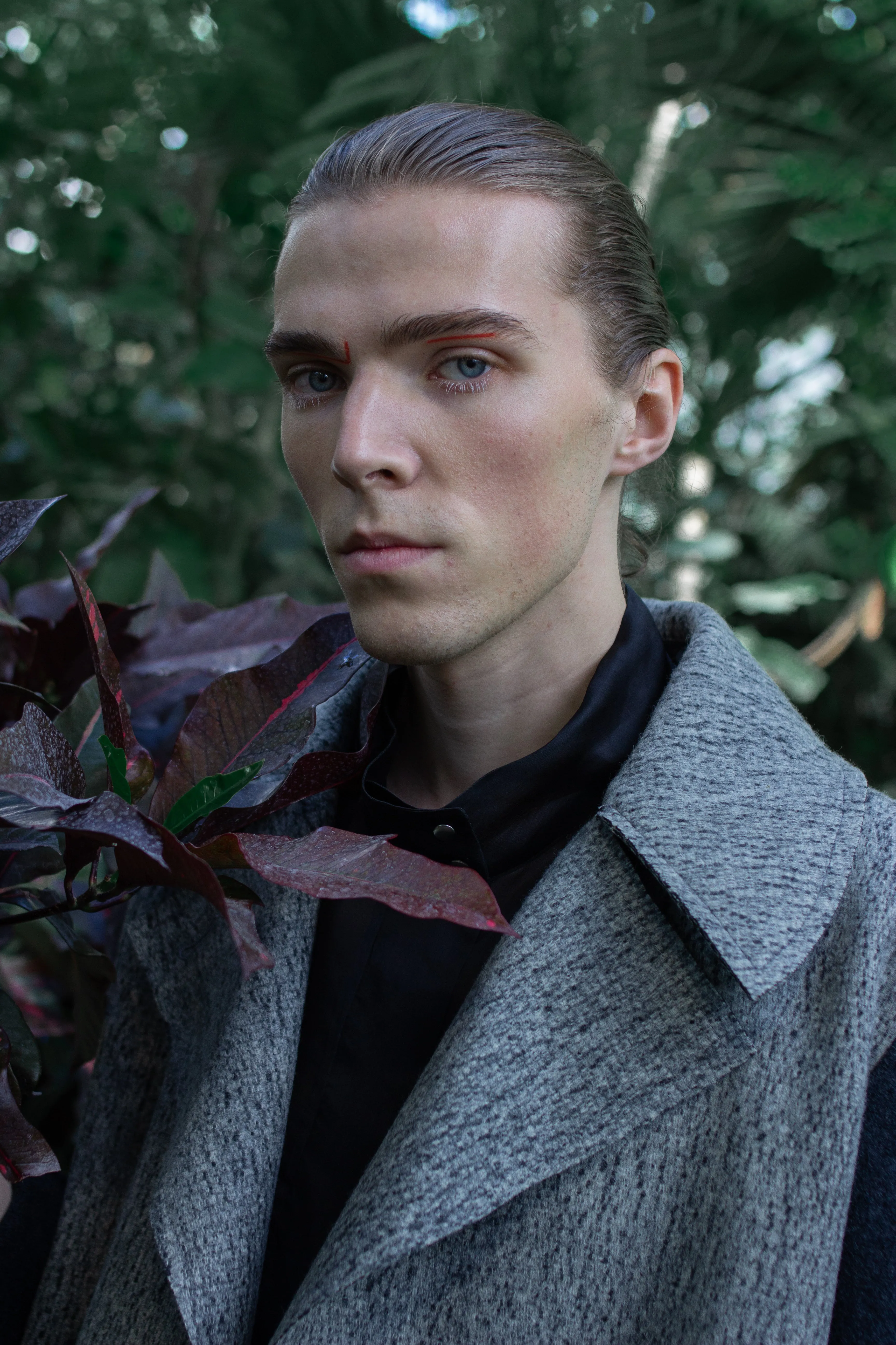 Gender-neutral Marbled Kobe Pea-coat with faux shearling sleeves
