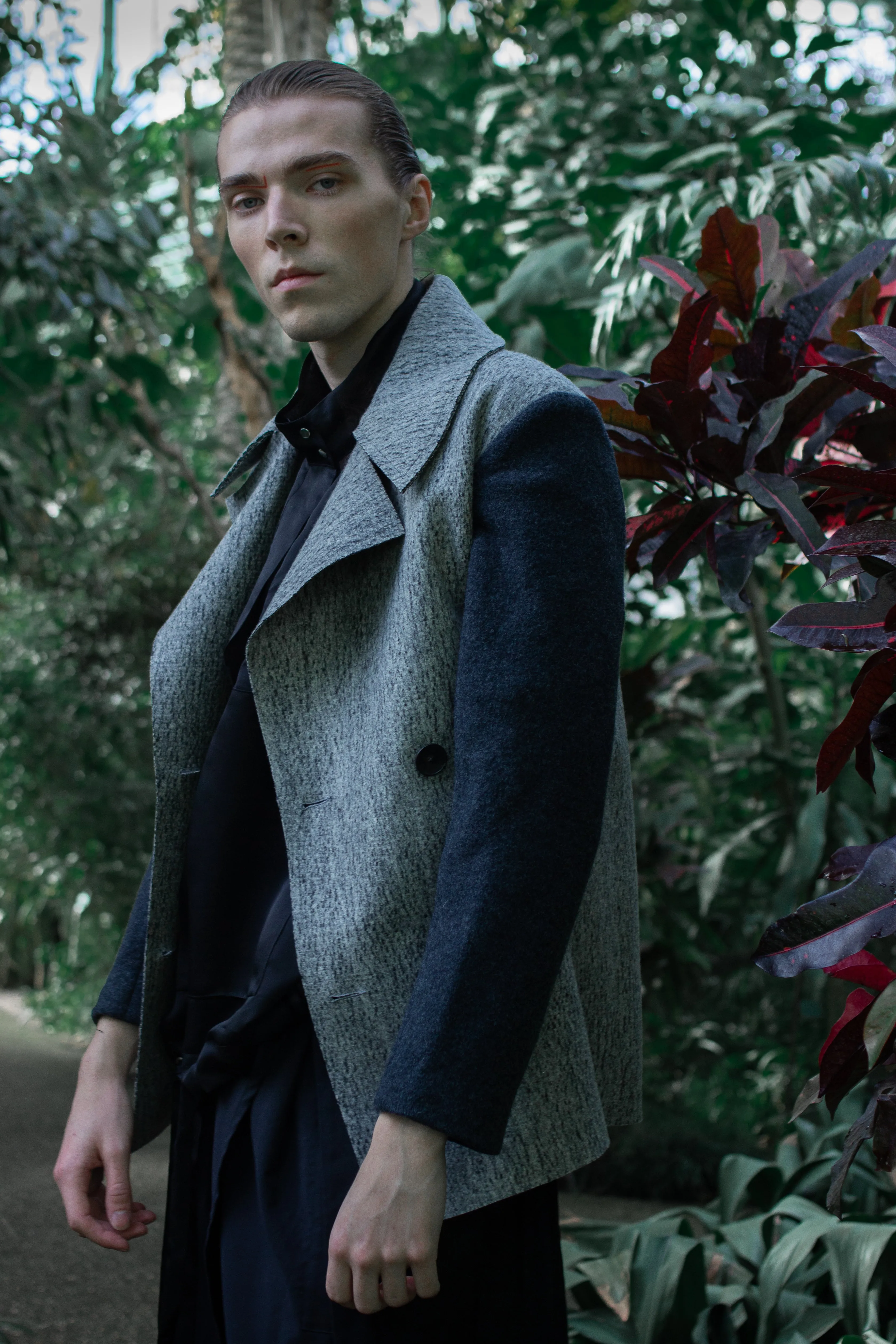 Gender-neutral Marbled Kobe Pea-coat with faux shearling sleeves